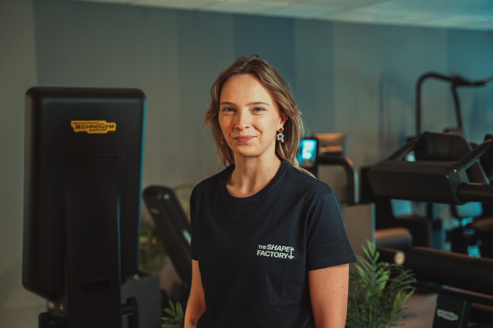 Teamportret in de trainingsruimte van The Shape Factory